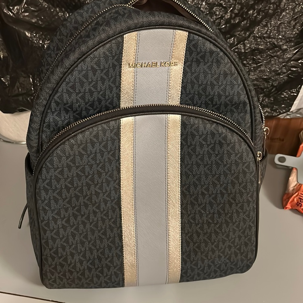 Michael Kors Large Backpack no tears or tears or breaks .